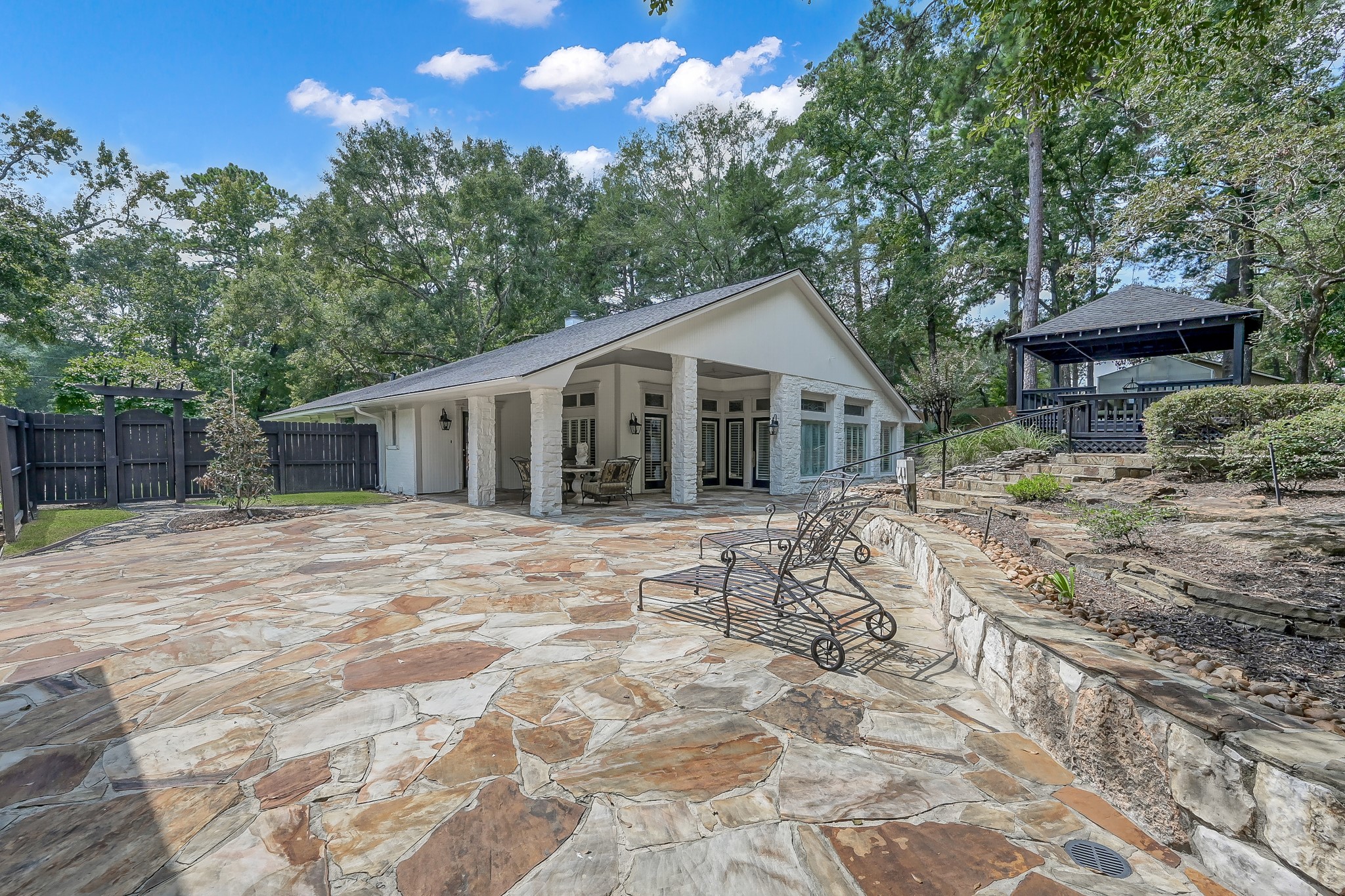 3272 Teas Nursery Road Conroe, TX 77304 - Photo 30 of 50 a view of a house with a yard