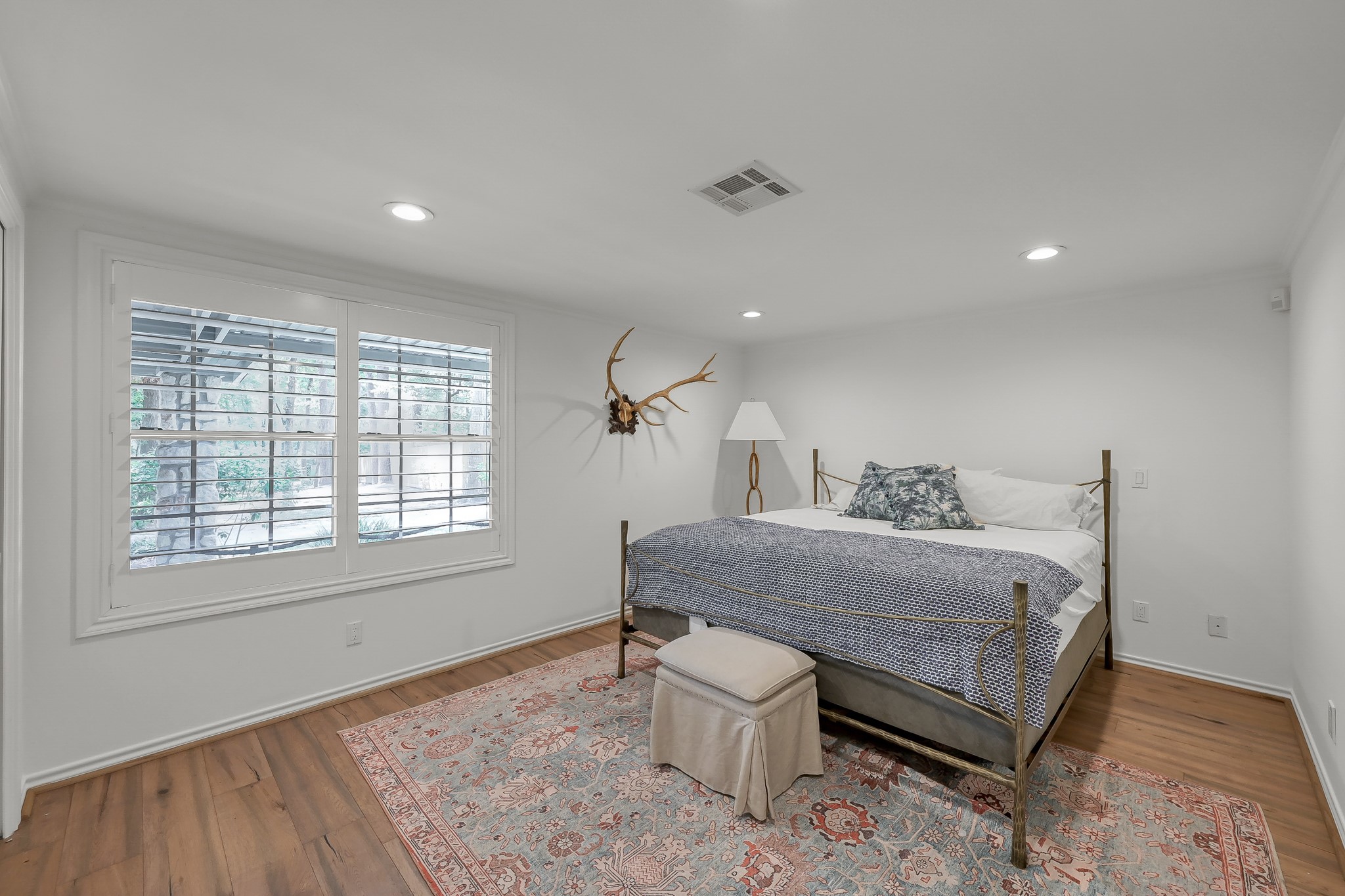 3272 Teas Nursery Road Conroe, TX 77304 - Photo 37 of 50 a room with a bed and a window