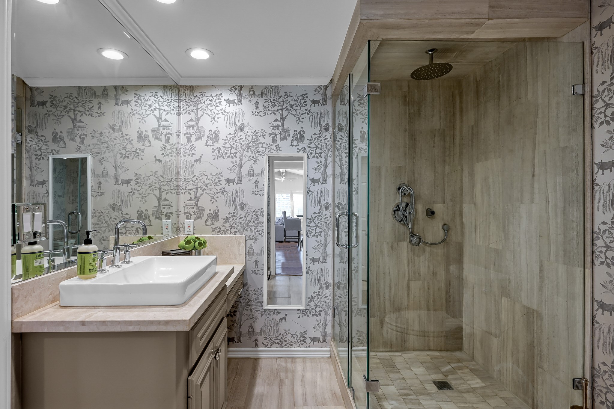3272 Teas Nursery Road Conroe, TX 77304 - Photo 39 of 50 a bathroom with a sink and a mirror