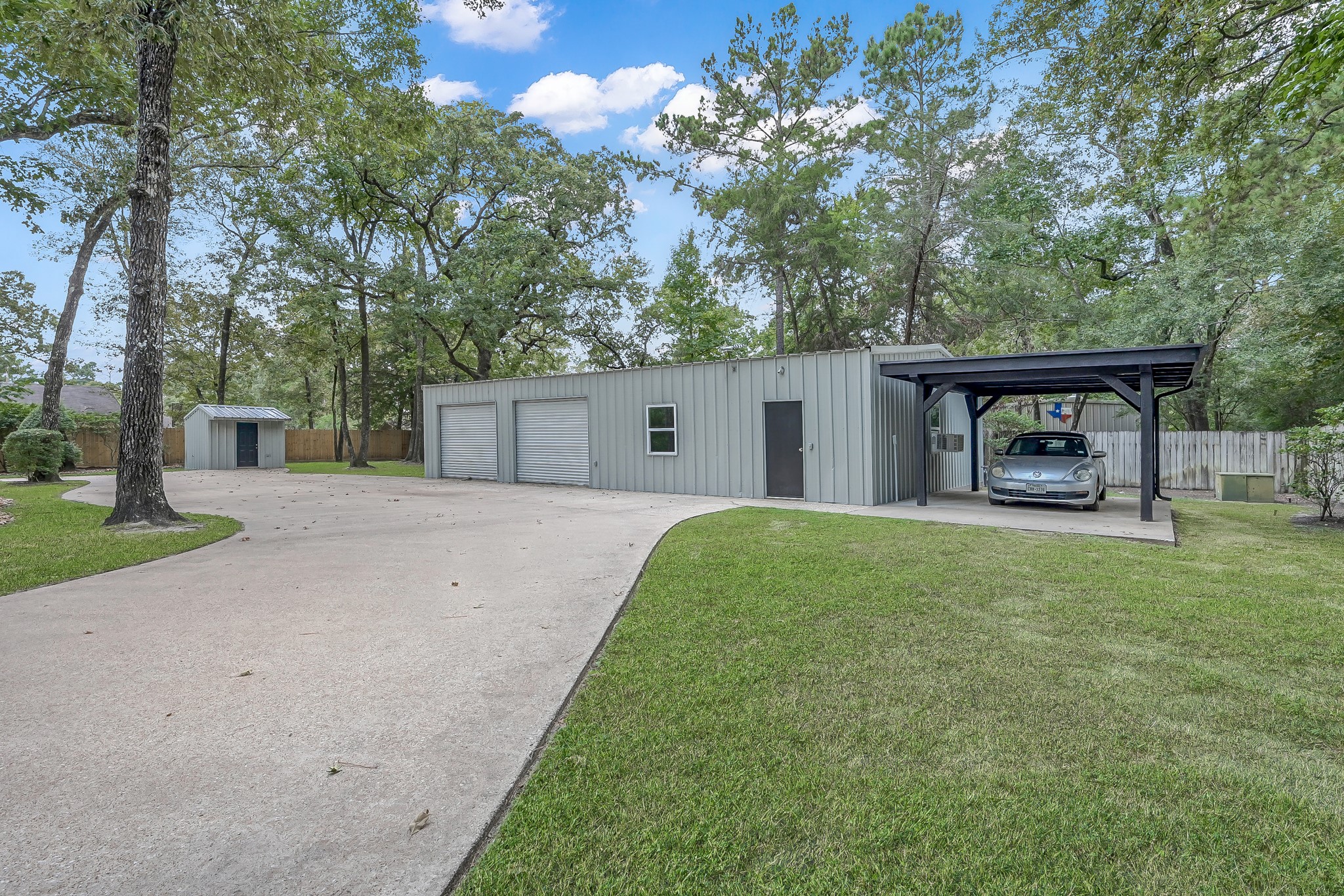 3272 Teas Nursery Road Conroe, TX 77304 - Photo 40 of 50 a front view of a house with garden