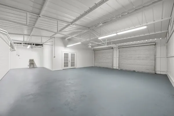 a view of hallway with wooden floor