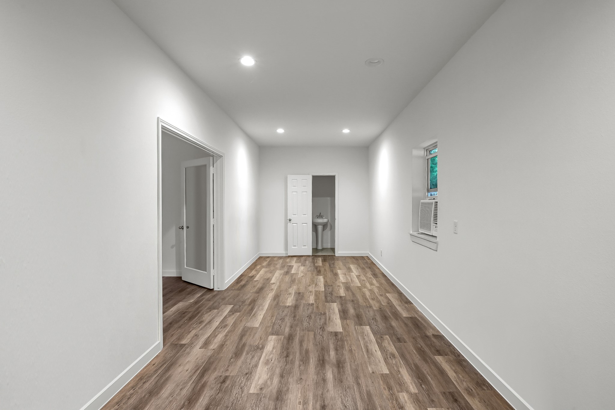 3272 Teas Nursery Road Conroe, TX 77304 - Photo 43 of 50 a view of hallway with wooden floor