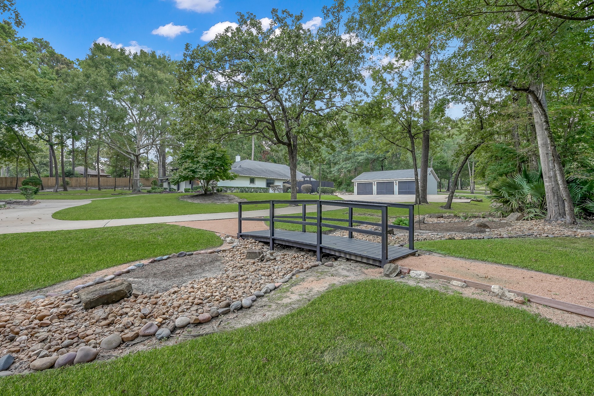 3272 Teas Nursery Road Conroe, TX 77304 - Photo 46 of 50 a view of a park with large trees