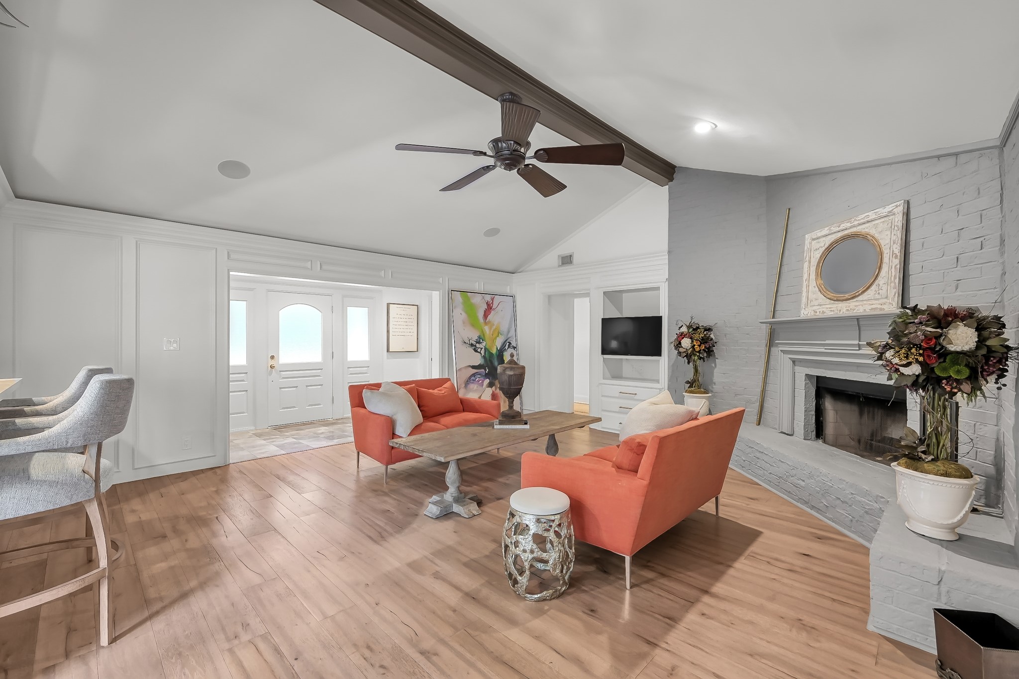 3272 Teas Nursery Road Conroe, TX 77304 - Photo 6 of 50 a living room with fireplace furniture and a flat screen tv