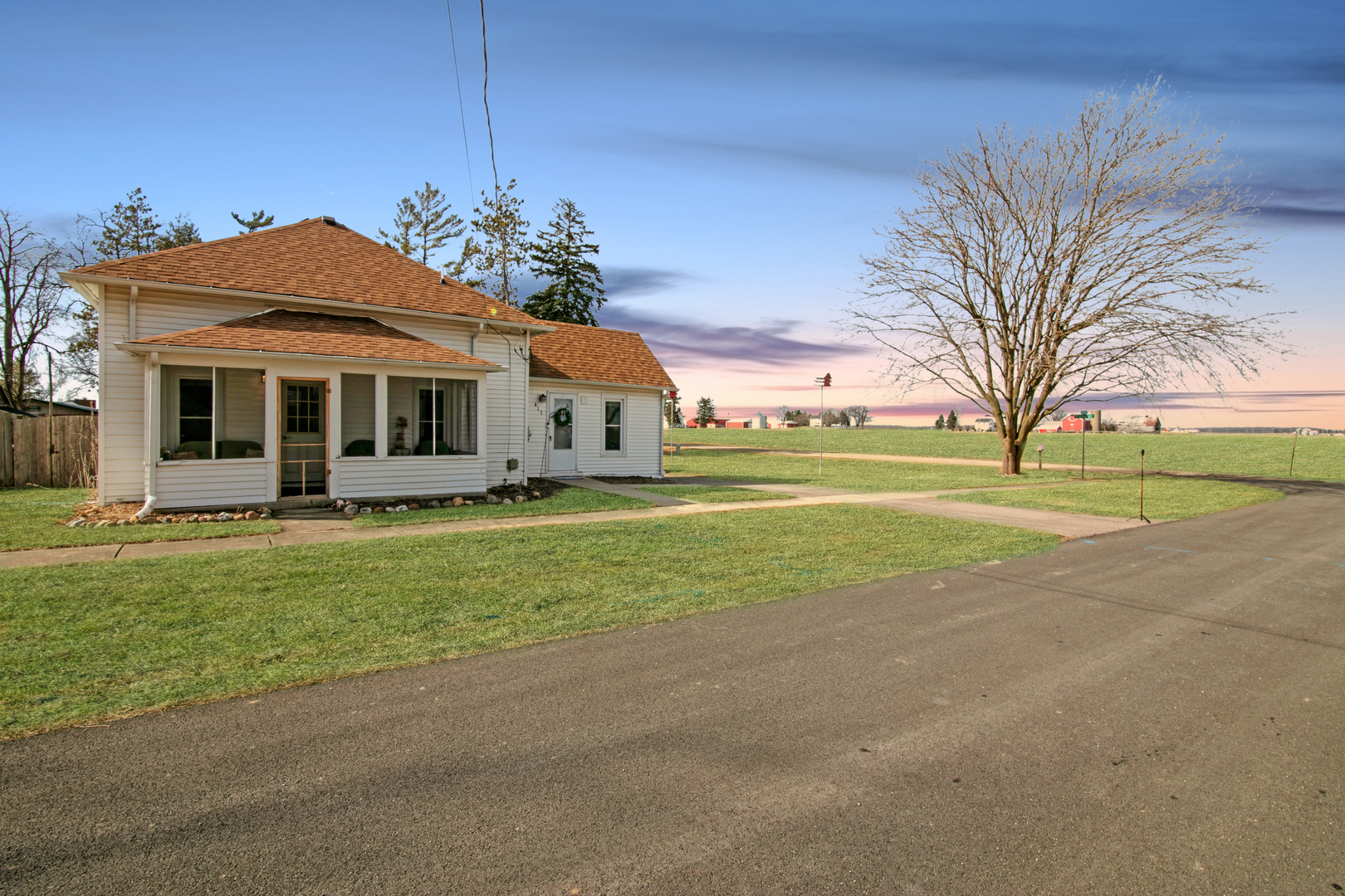 417 Virgil Street Maple Park, IL 60151 - Photo 1 of 26 a view of a house with a big yard and potted plants