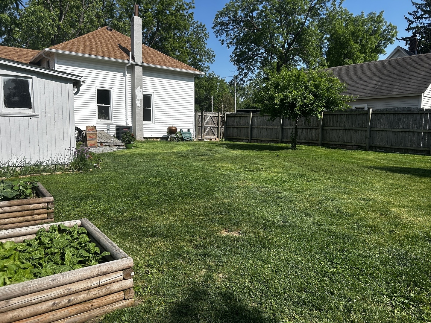417 Virgil Street Maple Park, IL 60151 - Photo 20 of 26 a view of backyard with small cabin