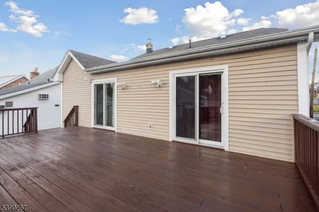 a view of a terrace with wooden floor and staircase