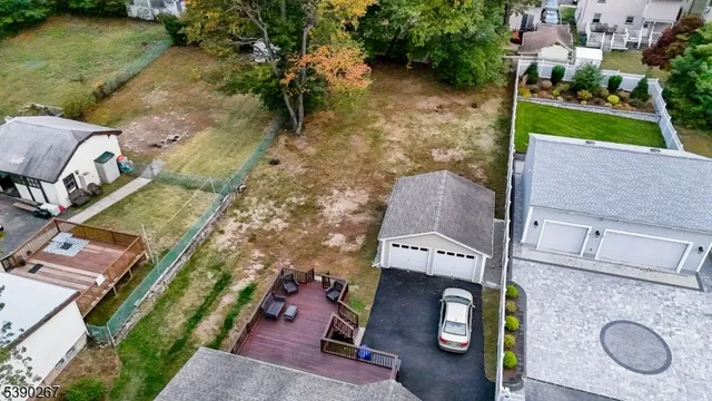 an aerial view of house with yard