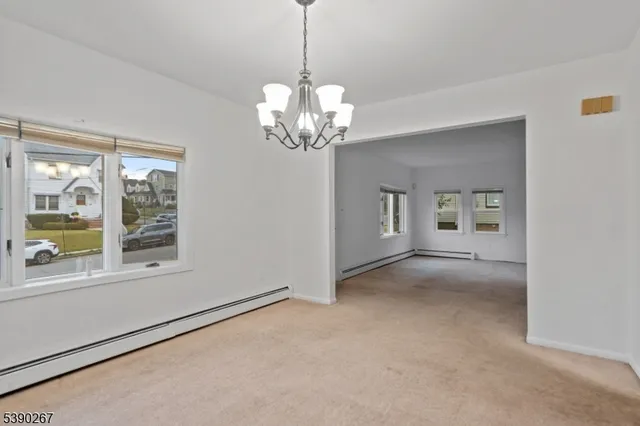 a view of a room with a large window