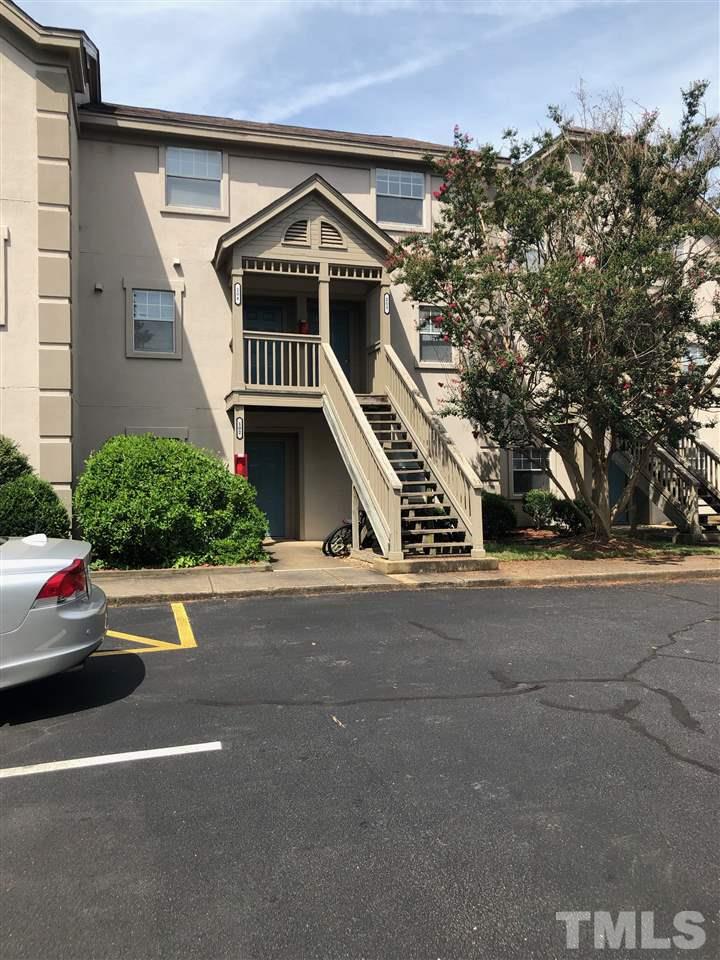 2506 Avent Ferry Road, Unit 203 Raleigh, NC 27606 - Photo 2 of 13 front view of a house with a street