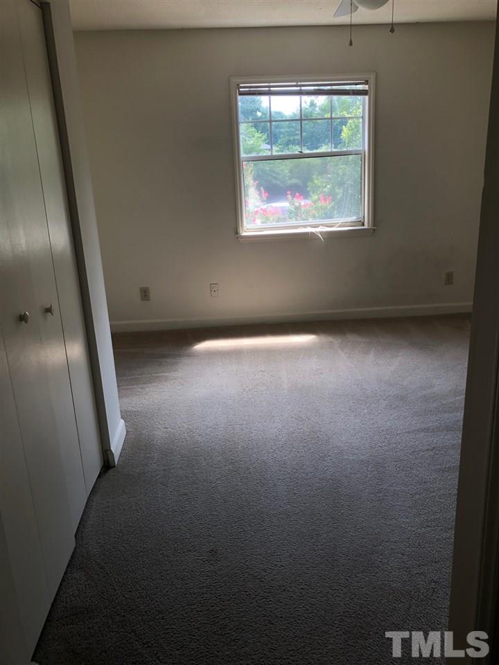 2506 Avent Ferry Road, Unit 203 Raleigh, NC 27606 - Photo 9 of 13 an empty room with window