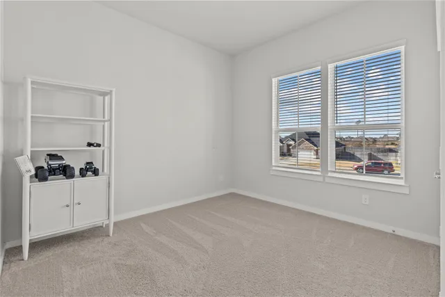 a bathroom with a sink a toilet a mirror a bathtub and shower