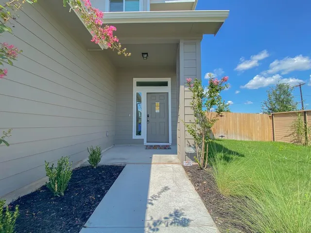 a front view of a house with a porch