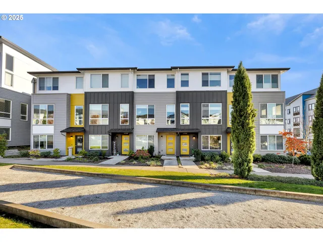 a view of building with a swimming pool