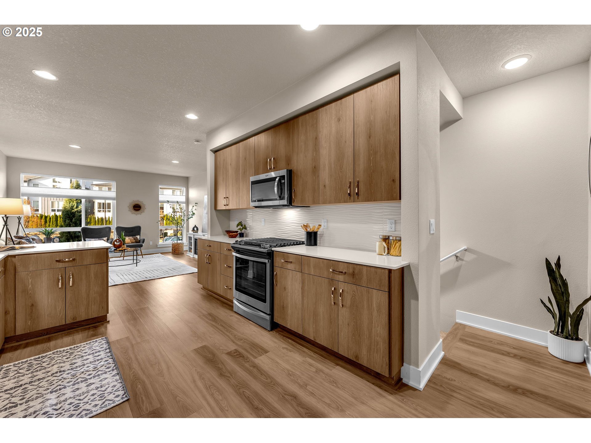 17238 Southwest Goldcrest Lane Beaverton, OR 97007 - Photo 11 of 48 a kitchen with stove and cabinets