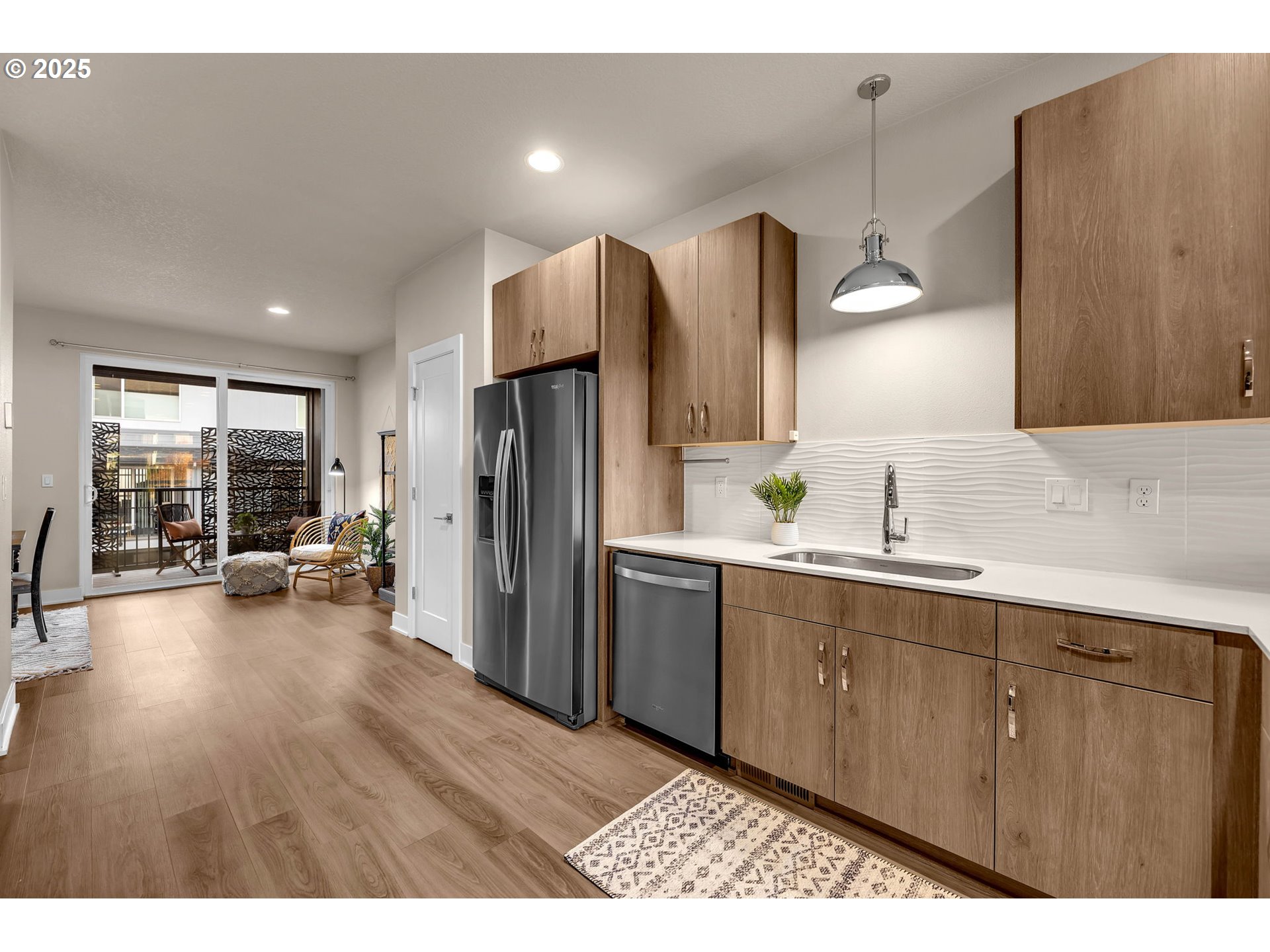 17238 Southwest Goldcrest Lane Beaverton, OR 97007 - Photo 15 of 48 a kitchen with refrigerator and sink