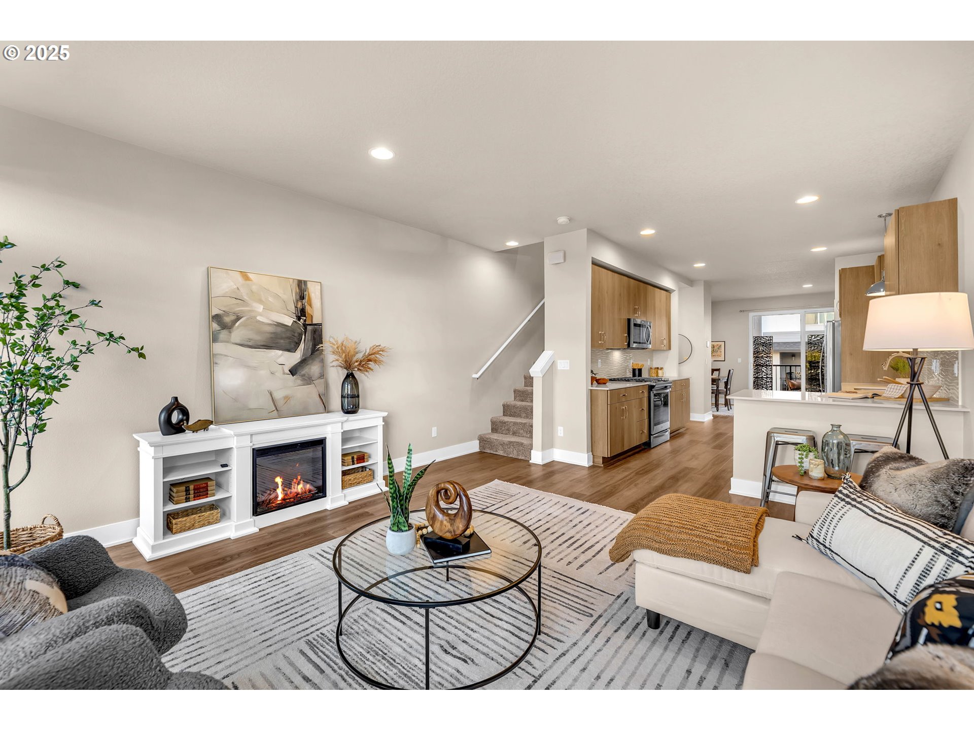 17238 Southwest Goldcrest Lane Beaverton, OR 97007 - Photo 18 of 48 a living room with furniture and a wooden floor