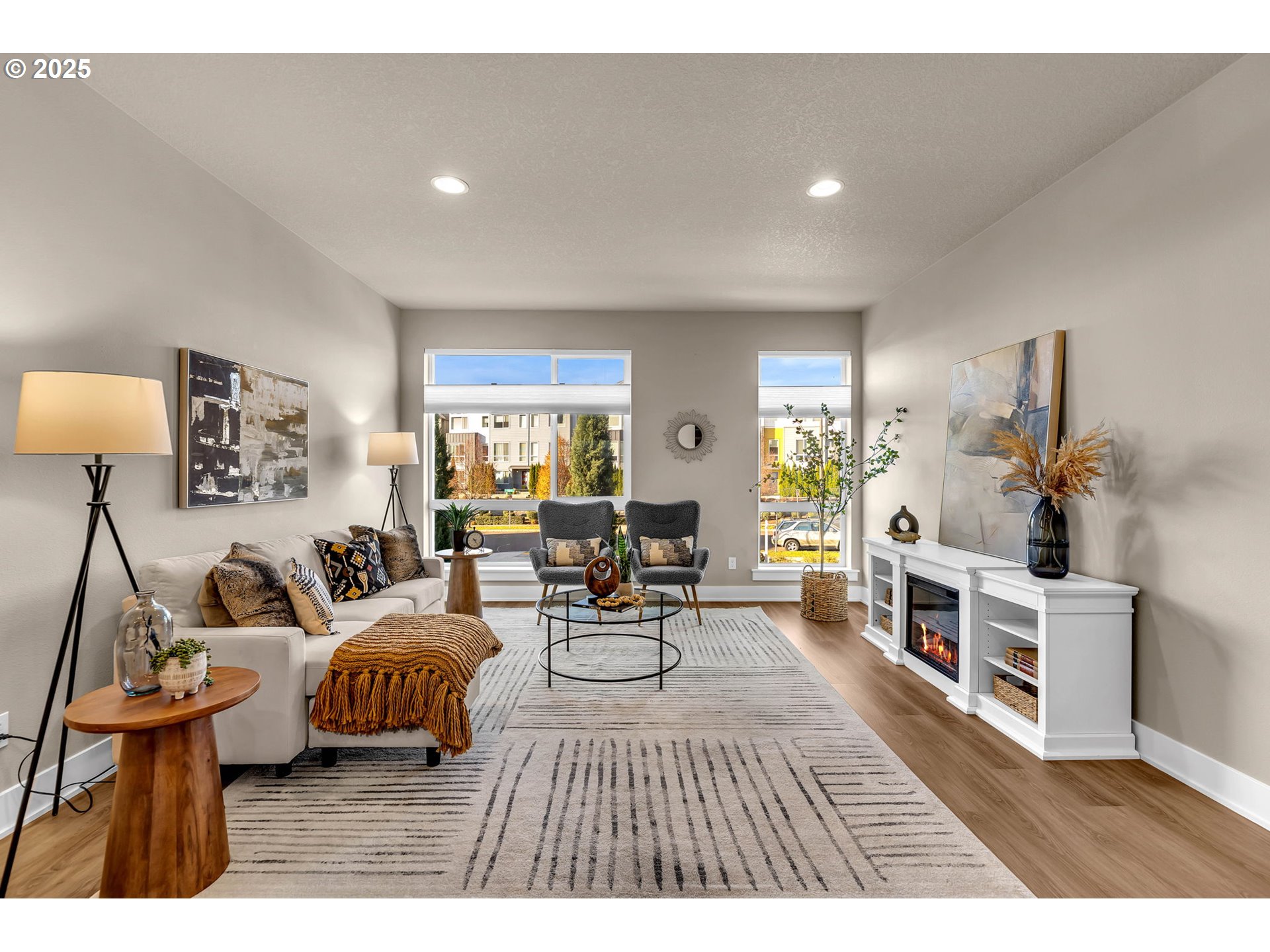 17238 Southwest Goldcrest Lane Beaverton, OR 97007 - Photo 20 of 48 a living room with furniture and a wooden floor