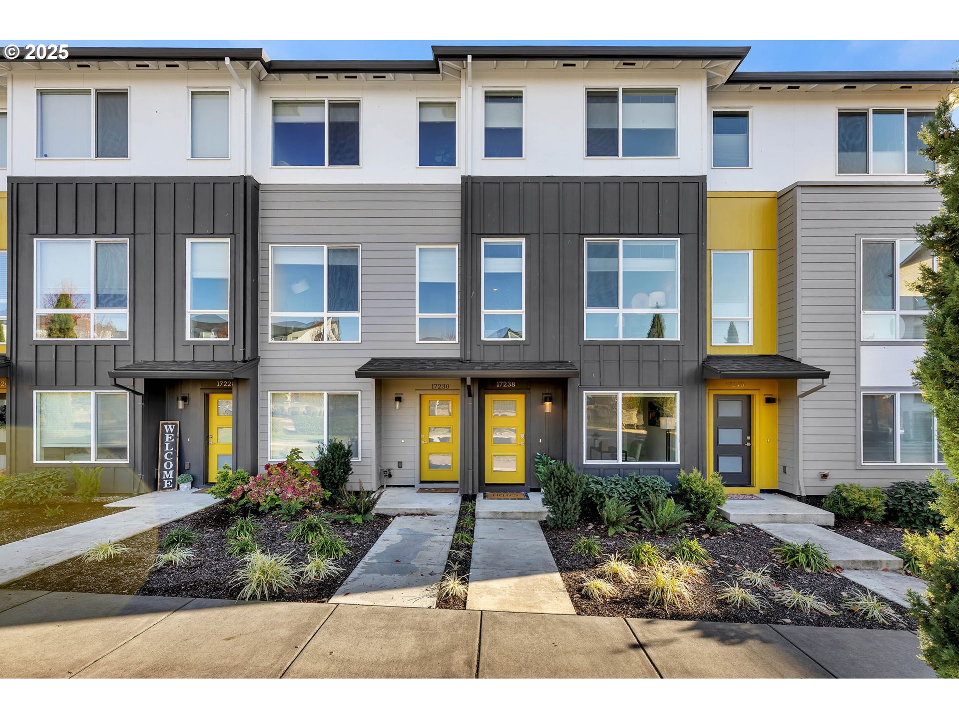 17238 Southwest Goldcrest Lane Beaverton, OR 97007 - Photo 2 of 48 a front view of a house