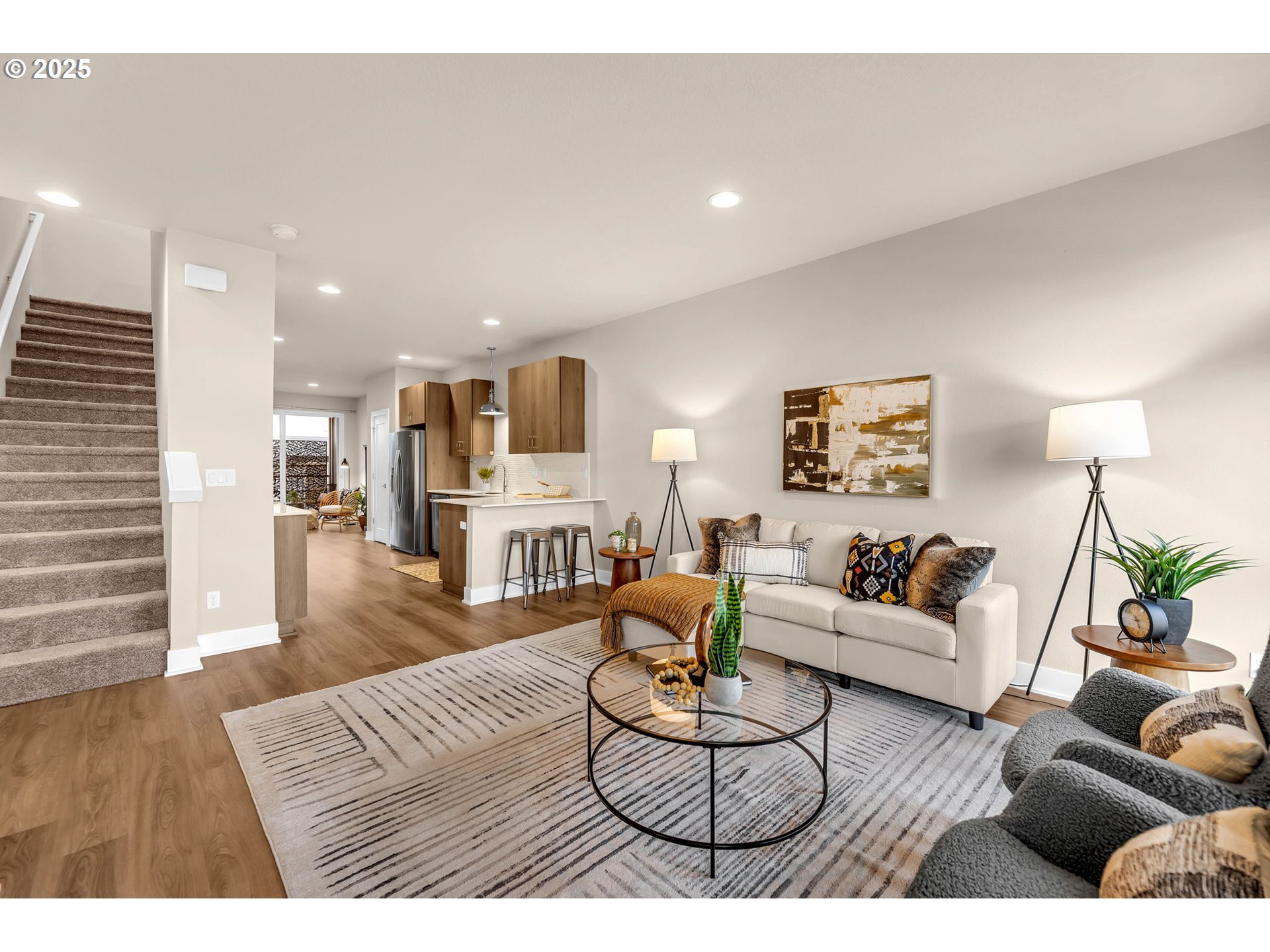 17238 Southwest Goldcrest Lane Beaverton, OR 97007 - Photo 22 of 48 a living room with furniture and wooden floor
