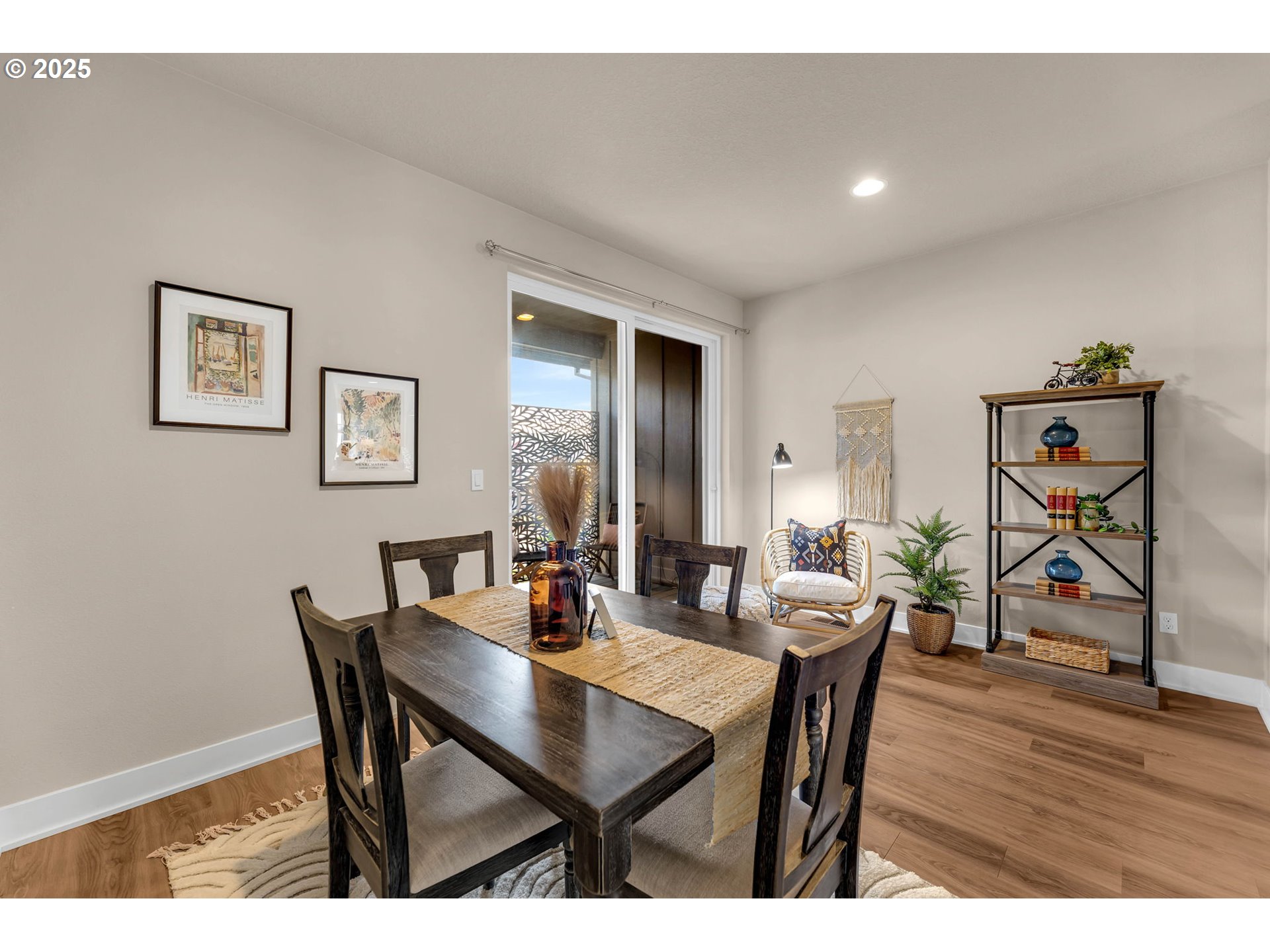 17238 Southwest Goldcrest Lane Beaverton, OR 97007 - Photo 24 of 48 a view of a dining room with furniture and wooden floor