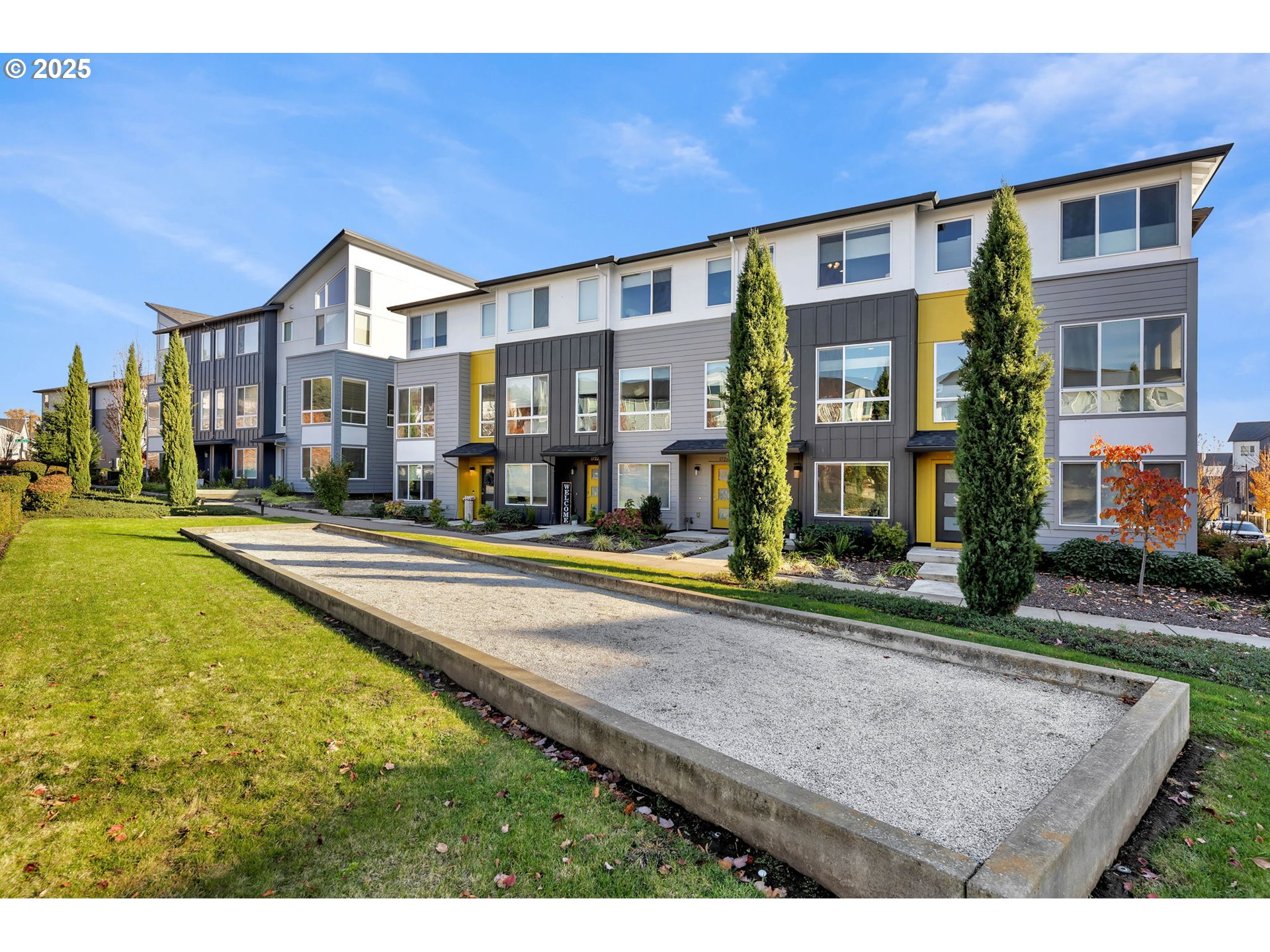 17238 Southwest Goldcrest Lane Beaverton, OR 97007 - Photo 3 of 48 a view of a building with a yard