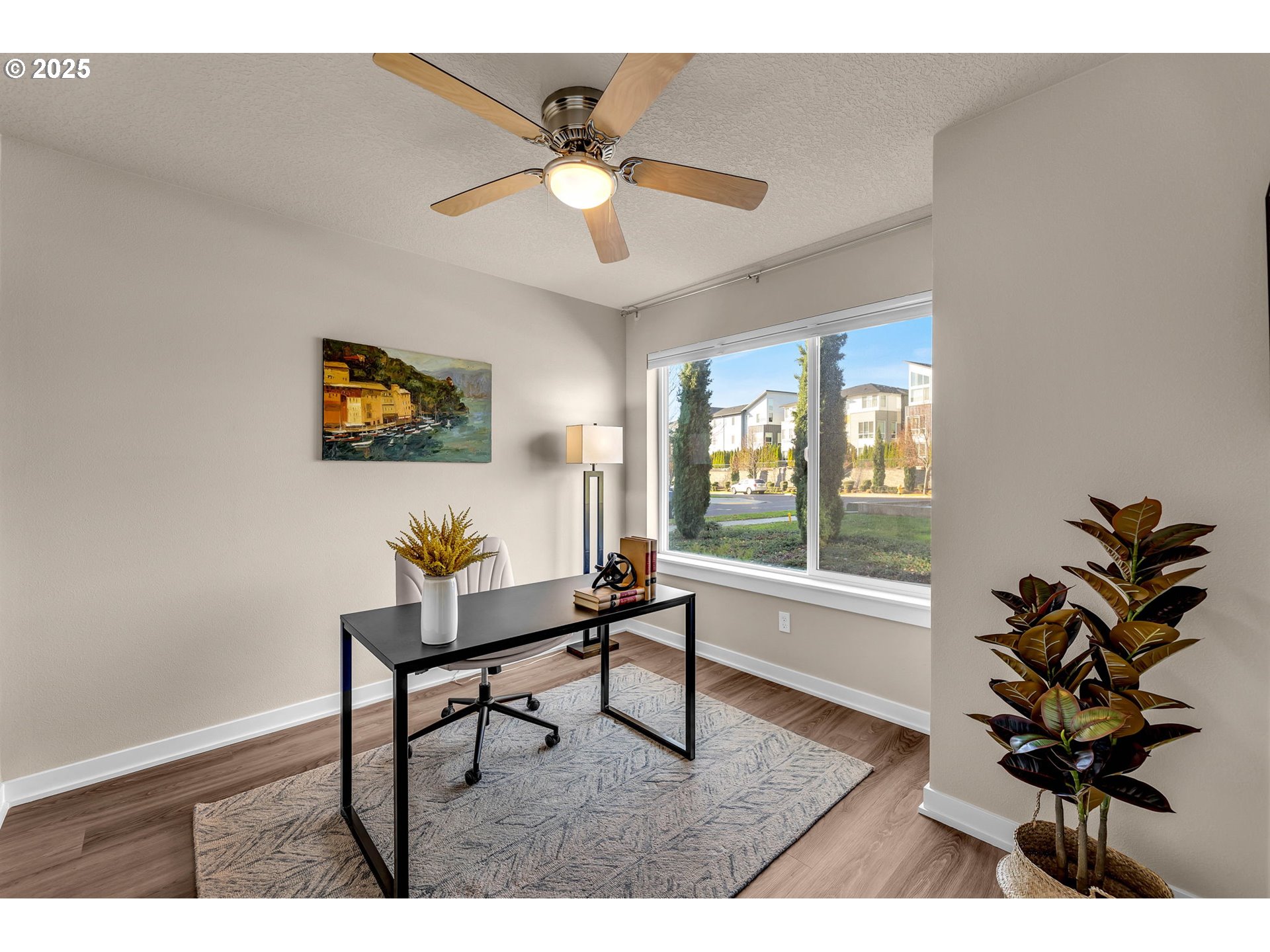 17238 Southwest Goldcrest Lane Beaverton, OR 97007 - Photo 8 of 48 a living room with furniture and a potted plant