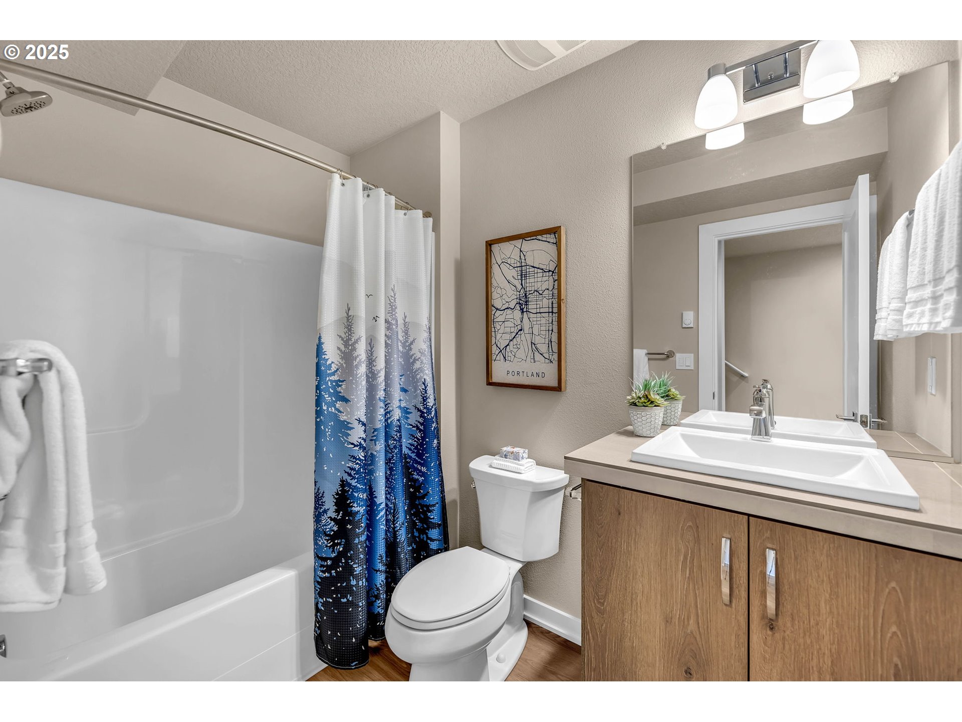 17238 Southwest Goldcrest Lane Beaverton, OR 97007 - Photo 10 of 48 a bathroom with a sink toilet vanity and shower
