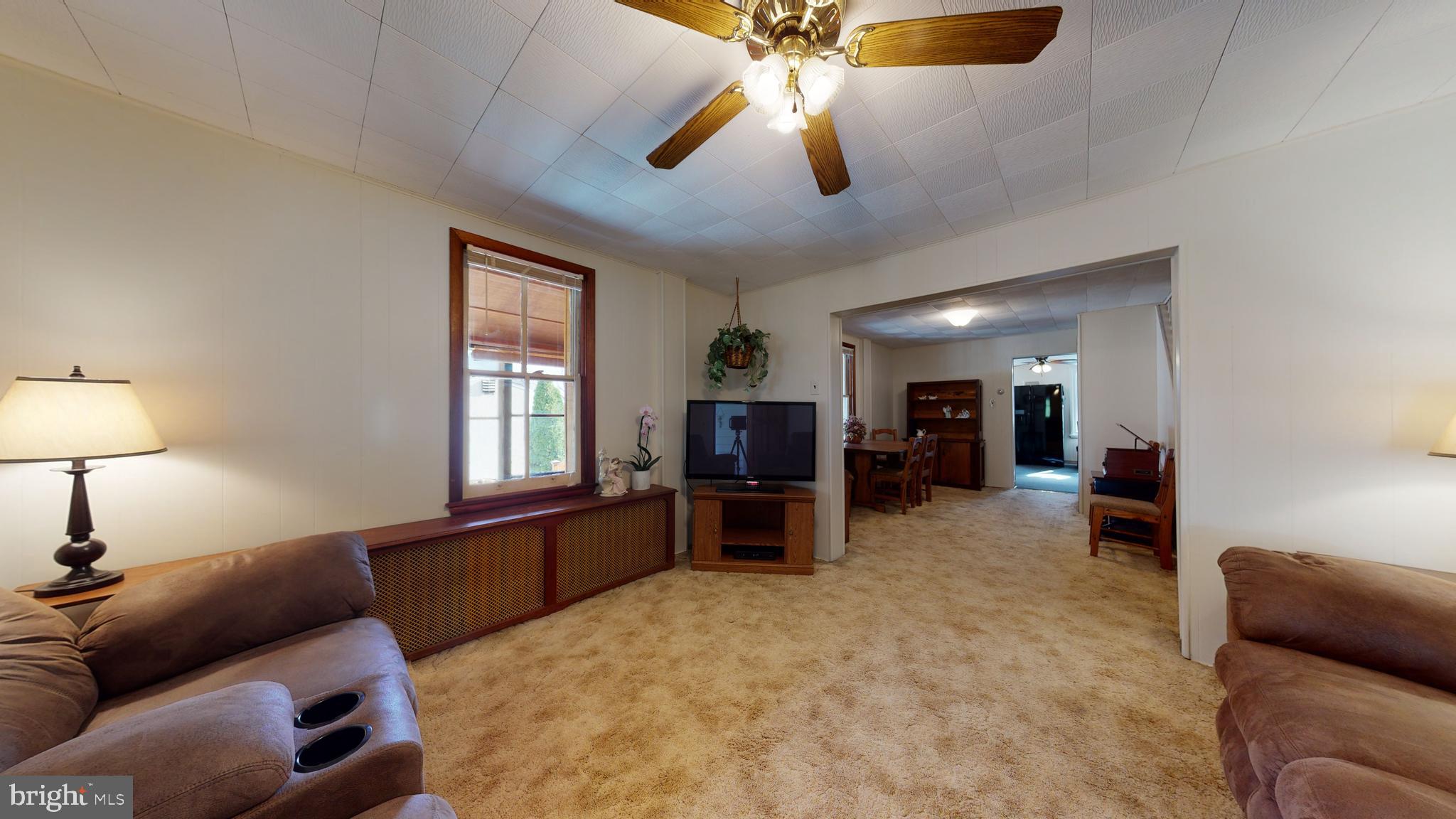 96 East Conestoga Road Devon, PA 19333 - Photo 8 of 35 Living Room Open to Dining Room