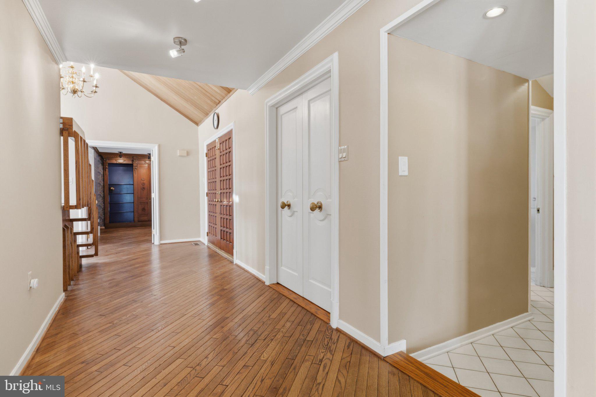 1983 Melmar Road Huntingdon Valley, PA 19006 - Photo 17 of 49 Hallway with Access to Mudroom/Garage/Powder Room
