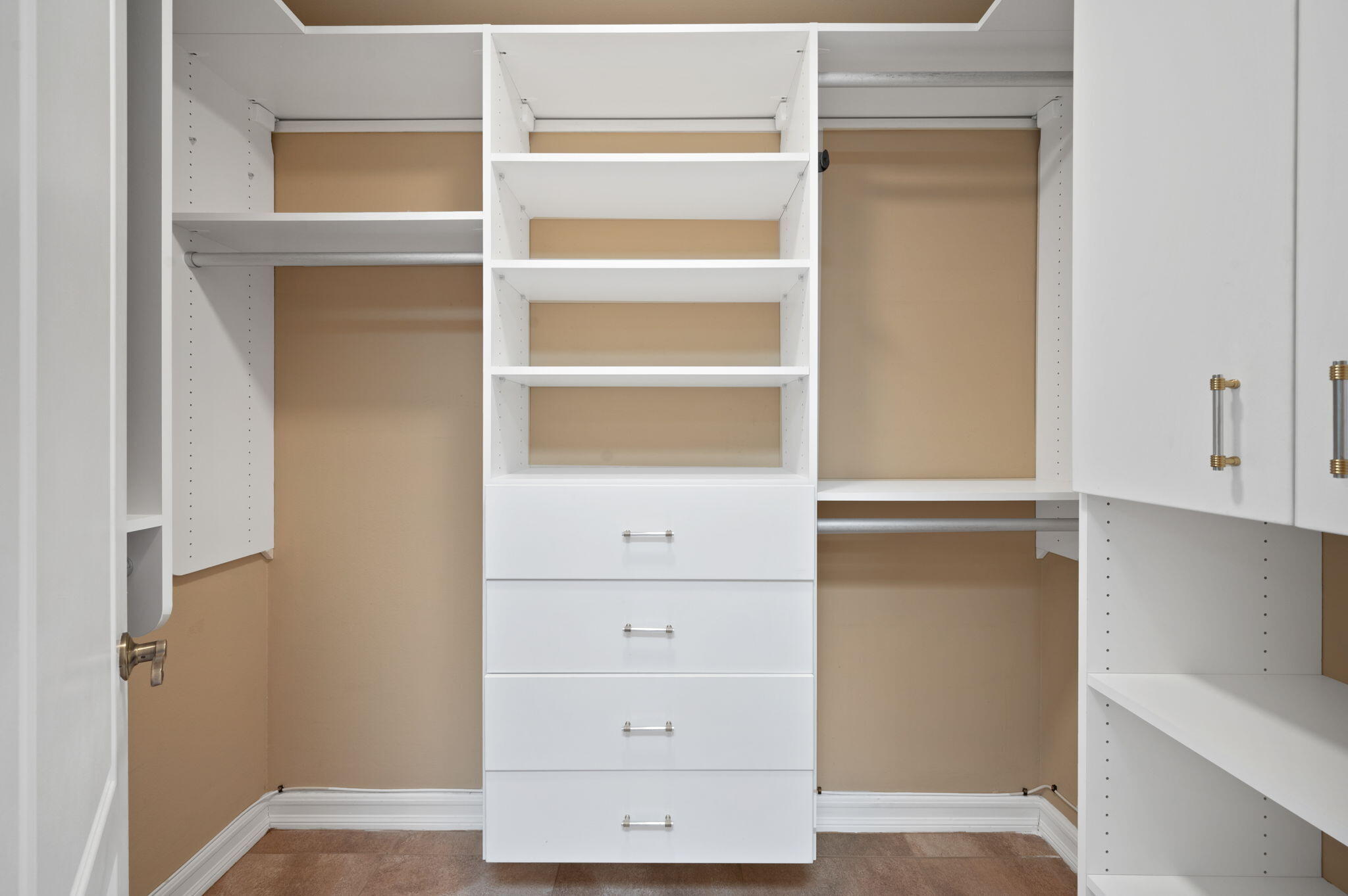 77675 Seminole Road Indian Wells, CA 92210 - Photo 26 of 40 a view of walk in closet with empty racks