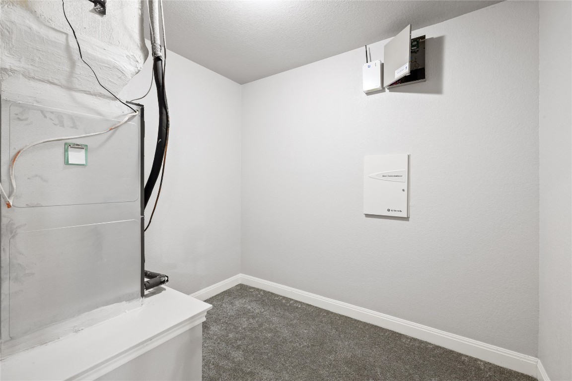 218 Sunrise Ridge Loop Lakeway, TX 78738 - Photo 30 of 40 a bathroom with a sink and a mirror