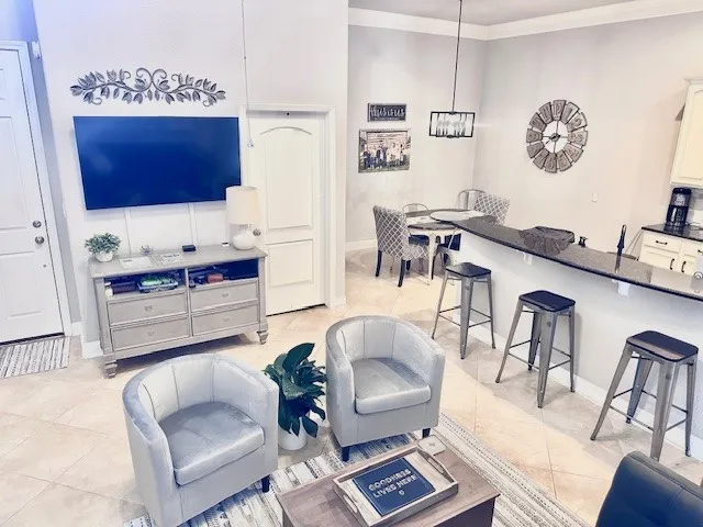 a kitchen with a sink and a mirror