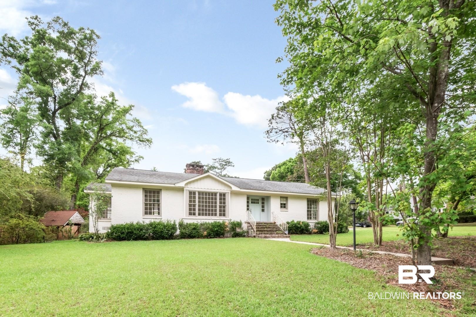 4 Turnout Lane Mobile, AL 36608 - Photo 40 of 53 Ranch-style house featuring a front yard and a chimney