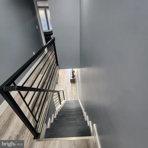 a view of stairs and furniture