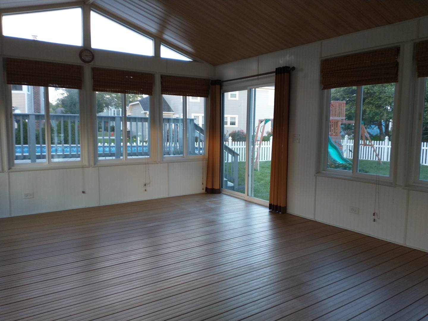 1726 Biesterfield Road Elk Grove Village, IL 60007 - Photo 22 of 25 an empty room with wooden floor and windows