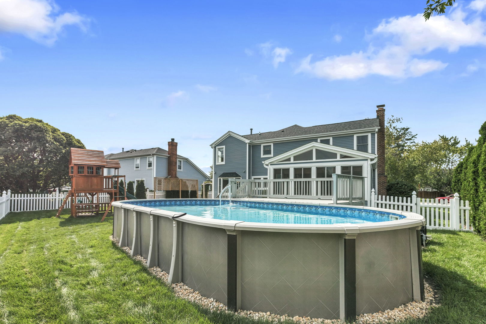 1726 Biesterfield Road Elk Grove Village, IL 60007 - Photo 23 of 25 a front view of a house with a yard