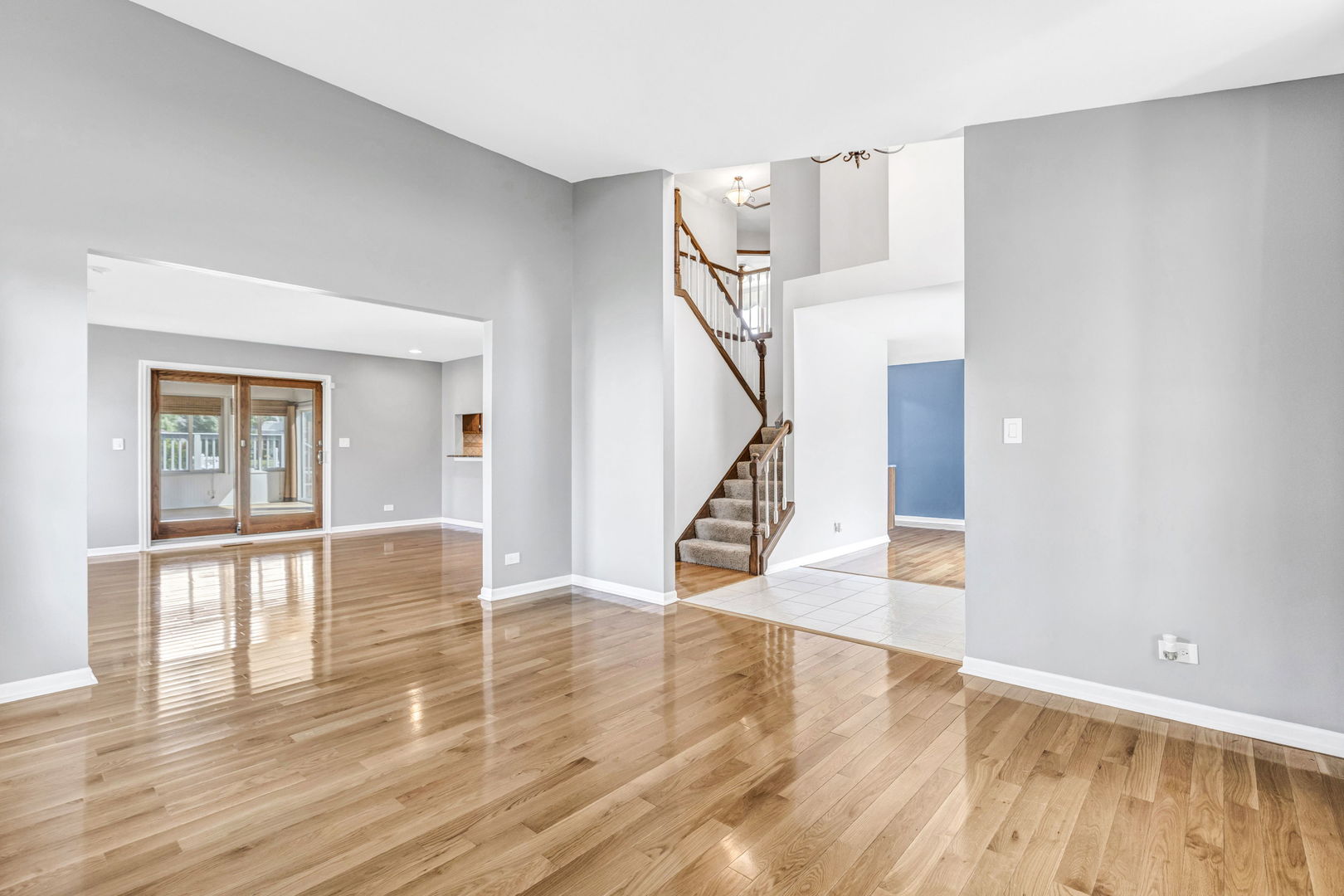 1726 Biesterfield Road Elk Grove Village, IL 60007 - Photo 5 of 25 a view of entryway and hall with wooden floor
