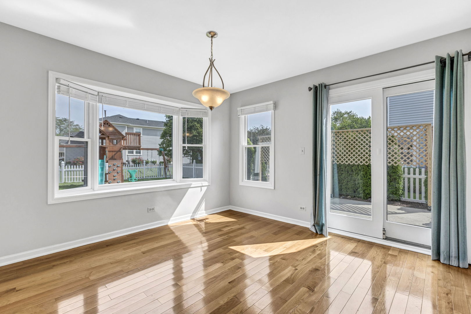 1726 Biesterfield Road Elk Grove Village, IL 60007 - Photo 10 of 25 a bedroom with a bed and a window