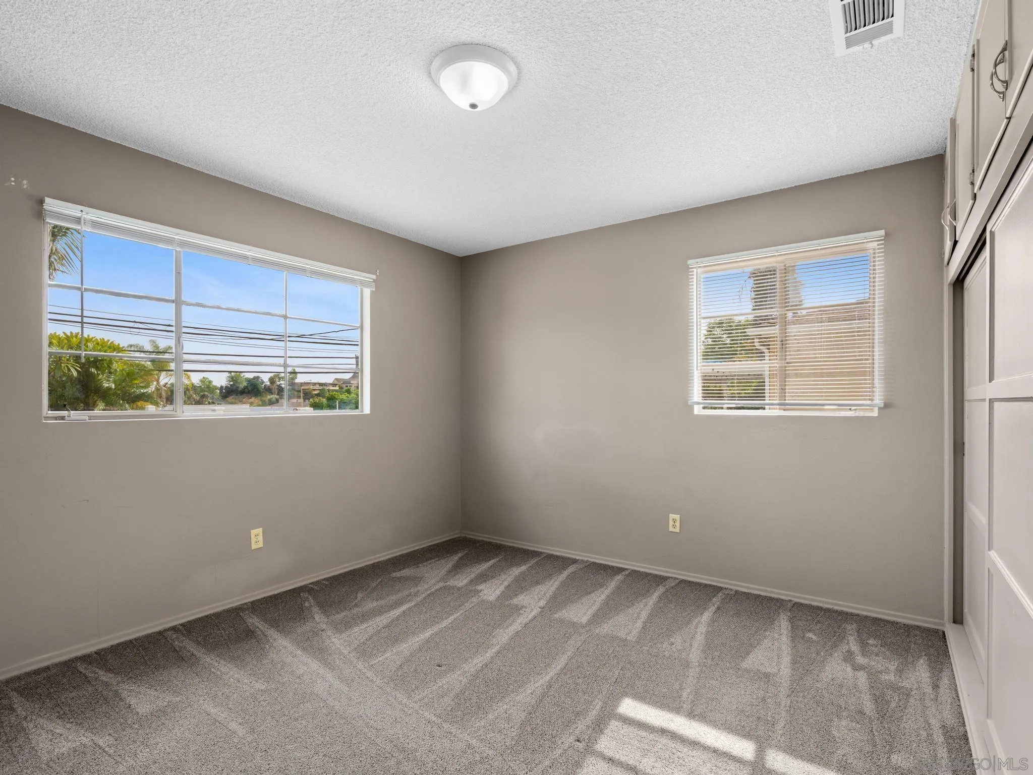 2529 Littleton Road El Cajon, CA 92020 - Photo 15 of 26 an empty room with windows