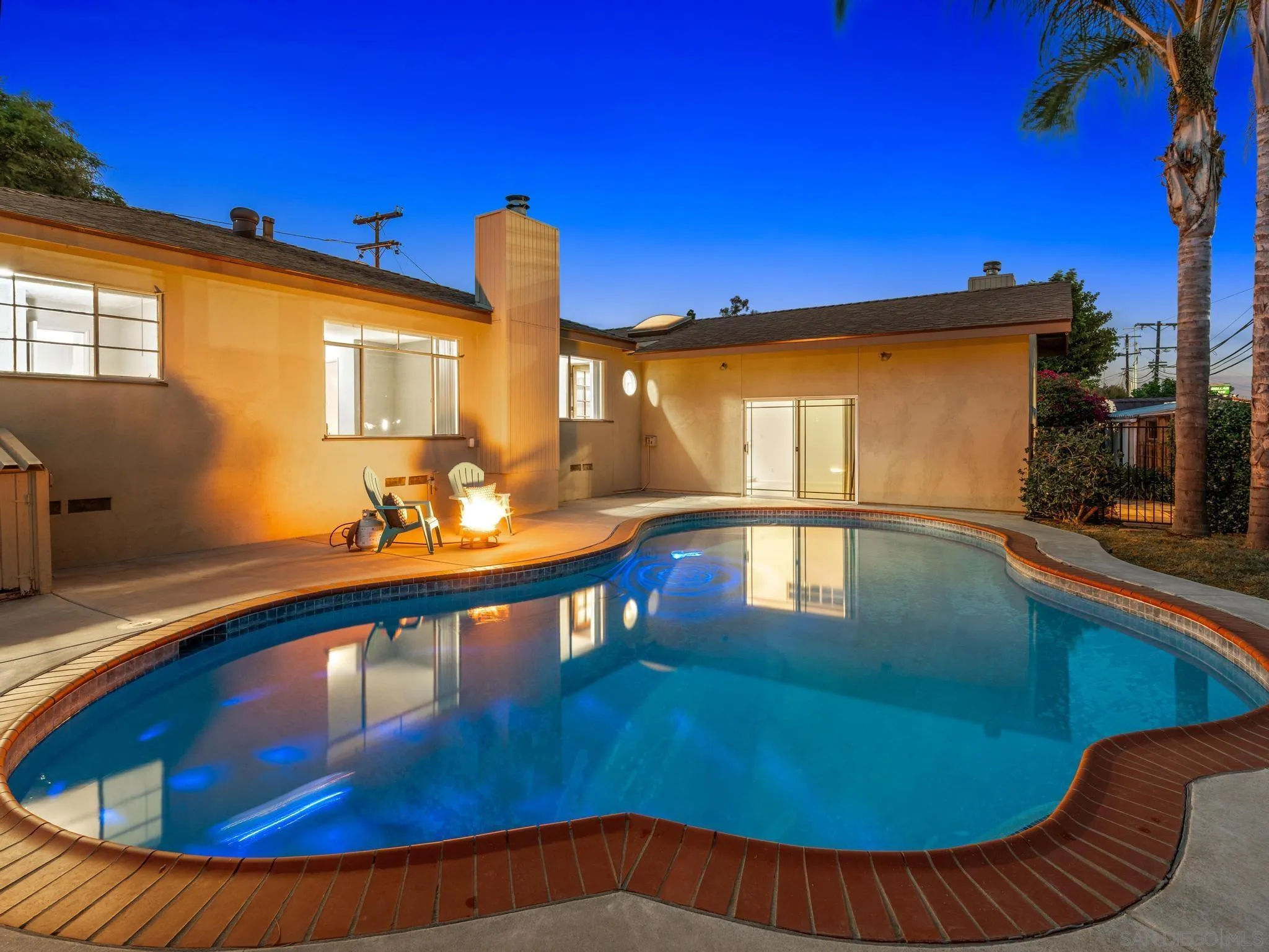 2529 Littleton Road El Cajon, CA 92020 - Photo 26 of 26 a view of a swimming pool with a lounge chair