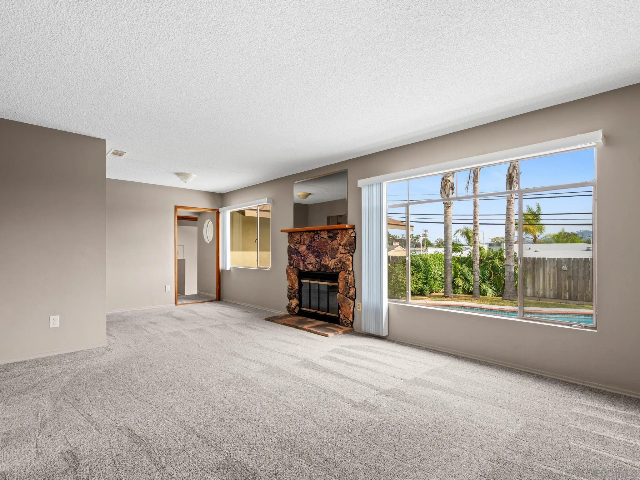 2529 Littleton Road El Cajon, CA 92020 - Photo 3 of 26 a view of a room with furniture and a large window