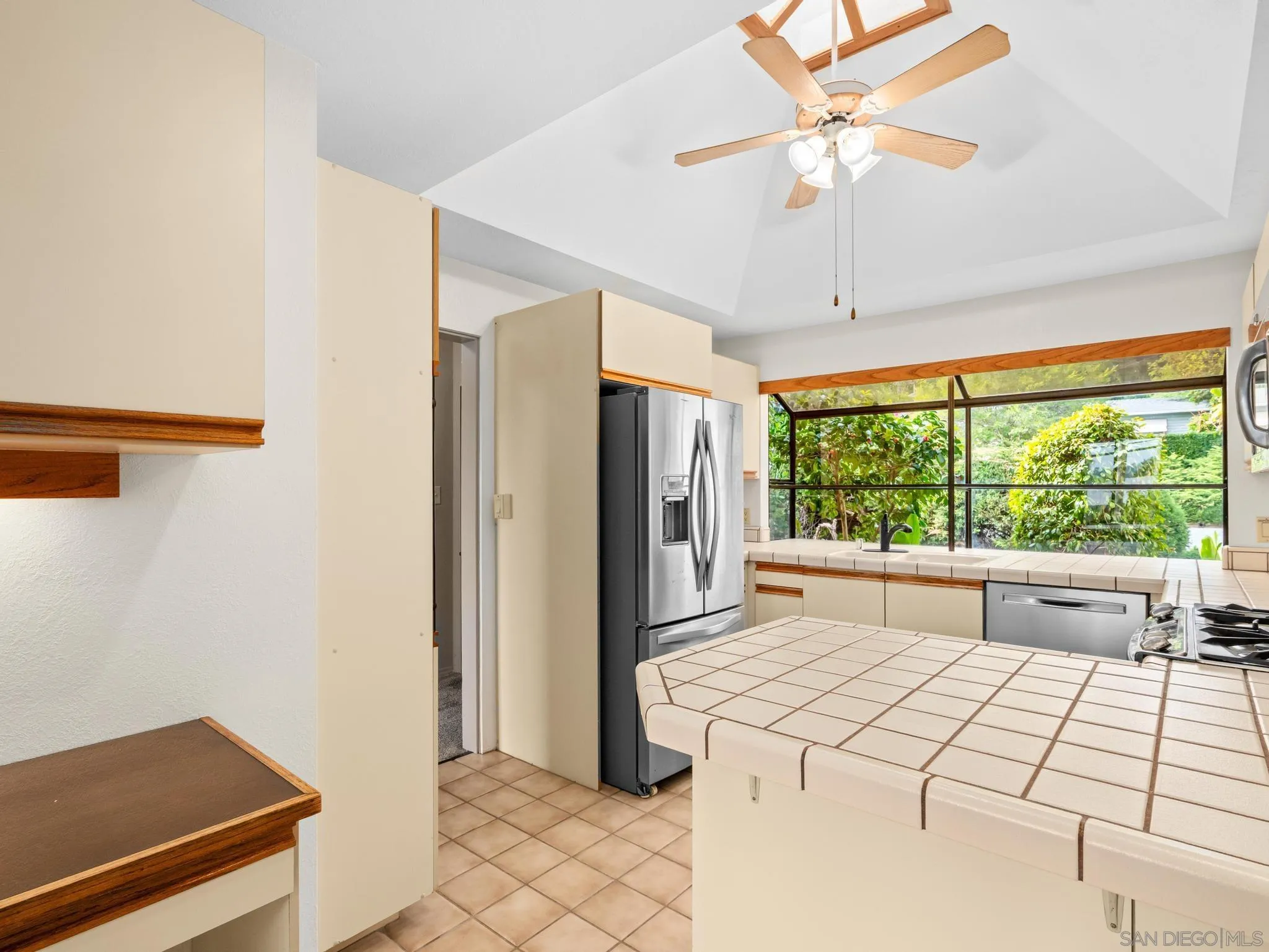 2529 Littleton Road El Cajon, CA 92020 - Photo 10 of 26 a room with a large bed and large window