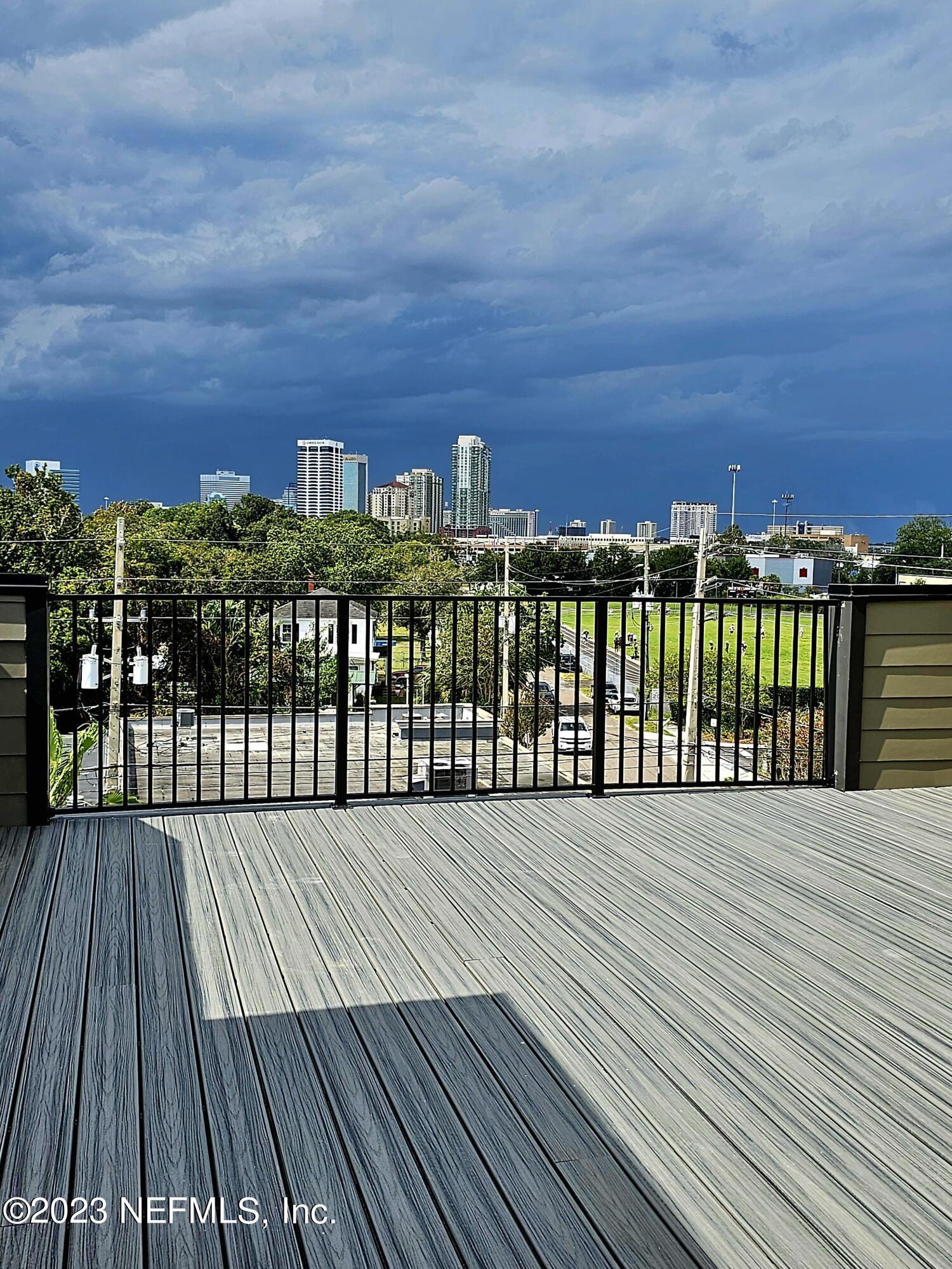 1625 Bridgeton Drive Jacksonville, FL 32207 - Photo 1 of 26 a view of a wooden deck