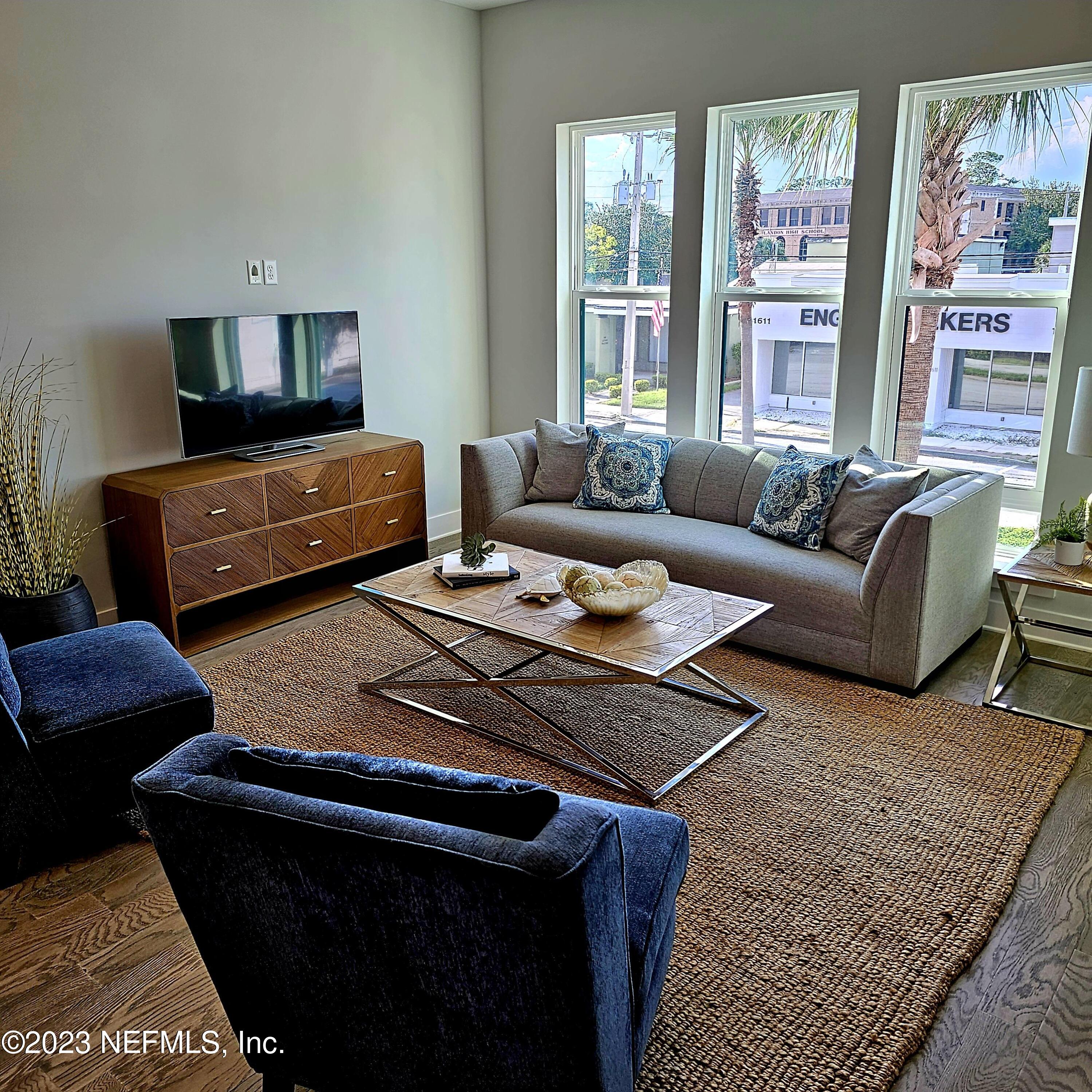 1625 Bridgeton Drive Jacksonville, FL 32207 - Photo 10 of 26 a living room with furniture and a window