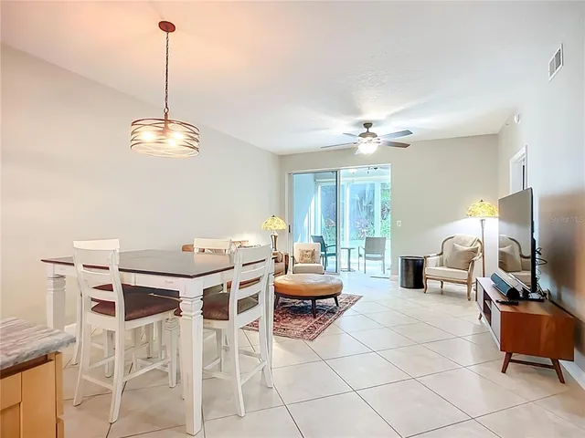 a view of a livingroom with furniture and a chandelier