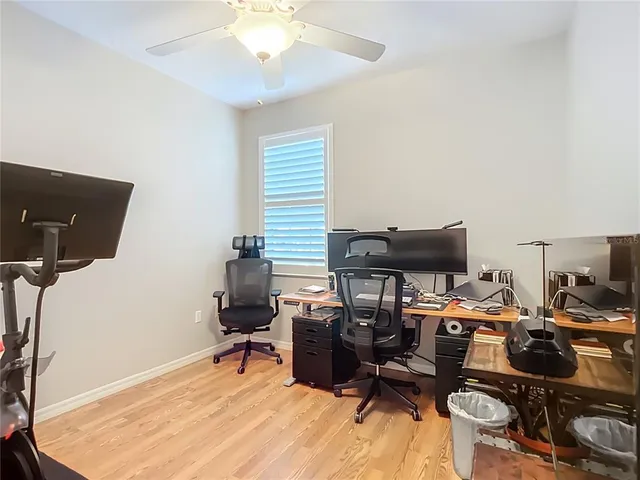 a view of a workspace with furniture