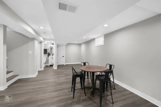 a view of a dining room with furniture