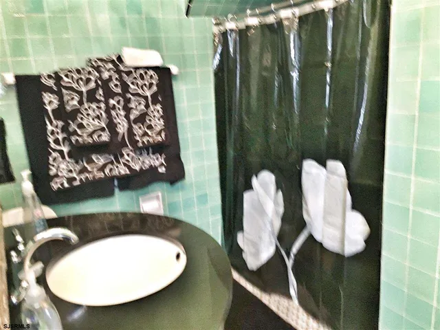 a bathroom with a toilet and a sink