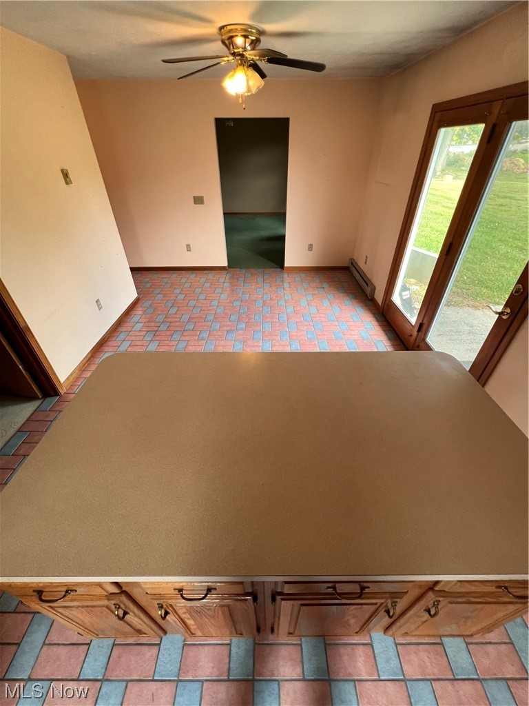 5435 Columbia Road Medina, OH 44256 - Photo 7 of 30 Tiled spare room featuring ceiling fan and a baseboard radiator